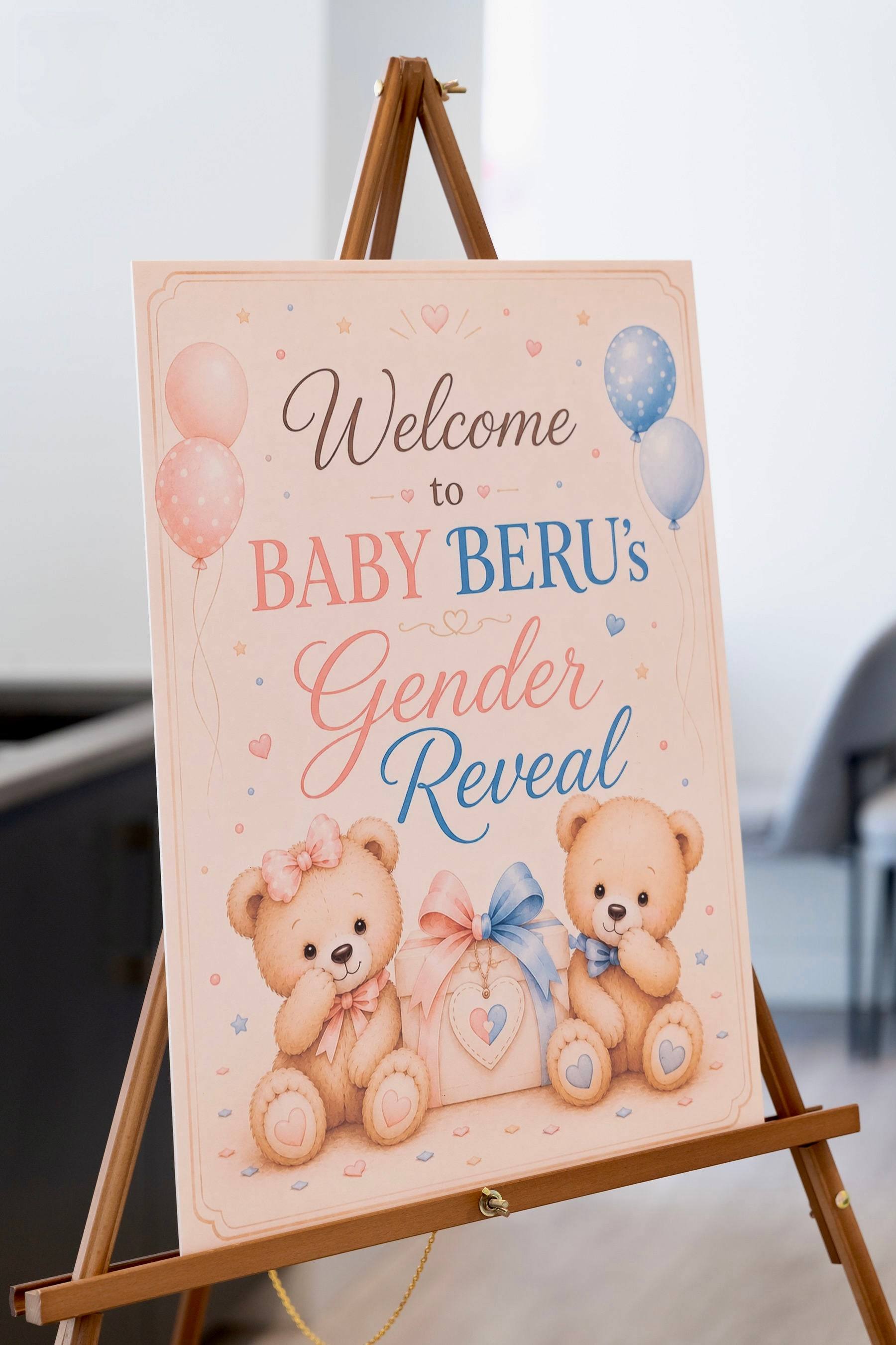 Welcome sign with teddy bears for a gender reveal party on an easel