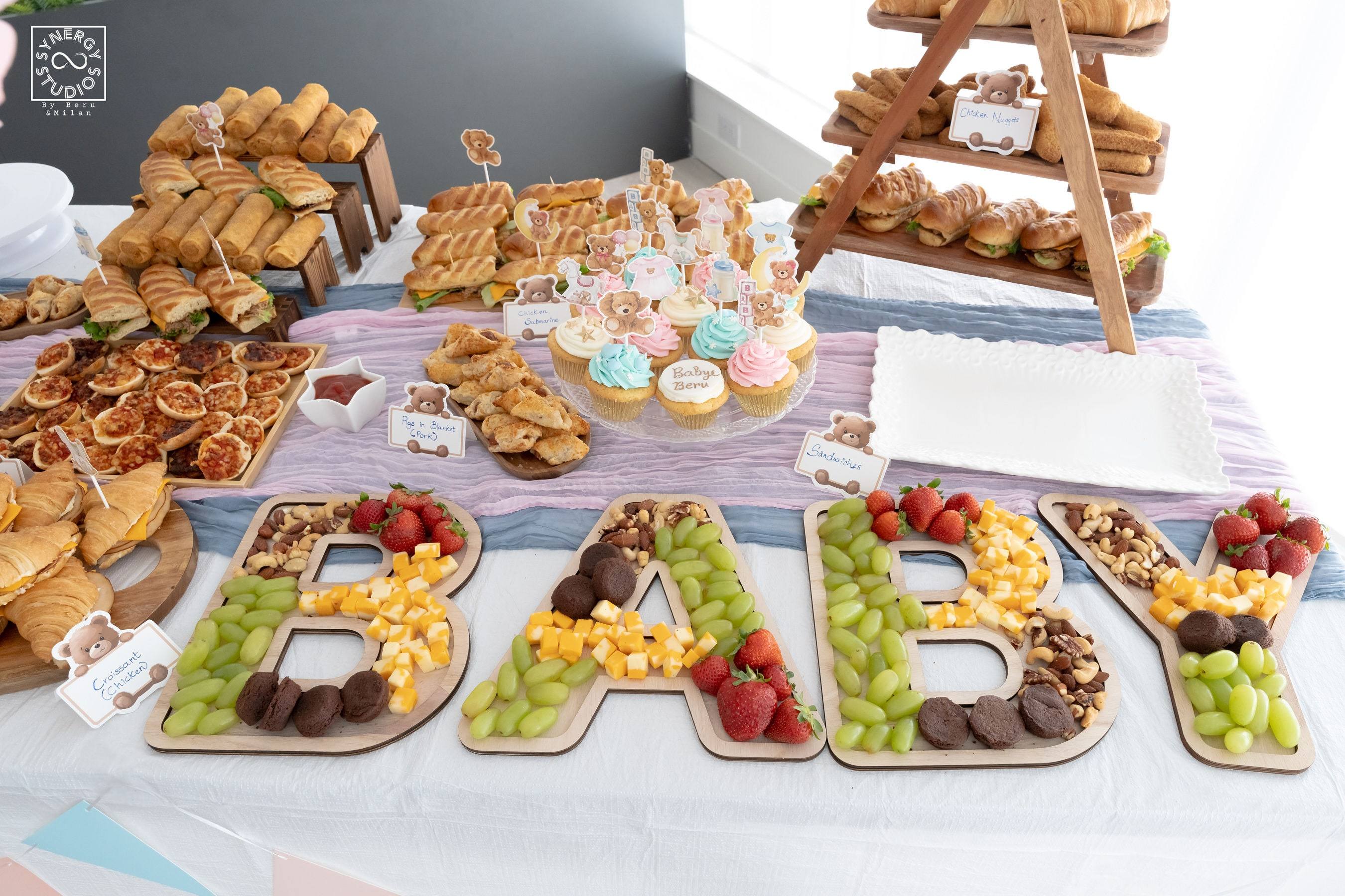 Fruit platter spelling BABY on a party table