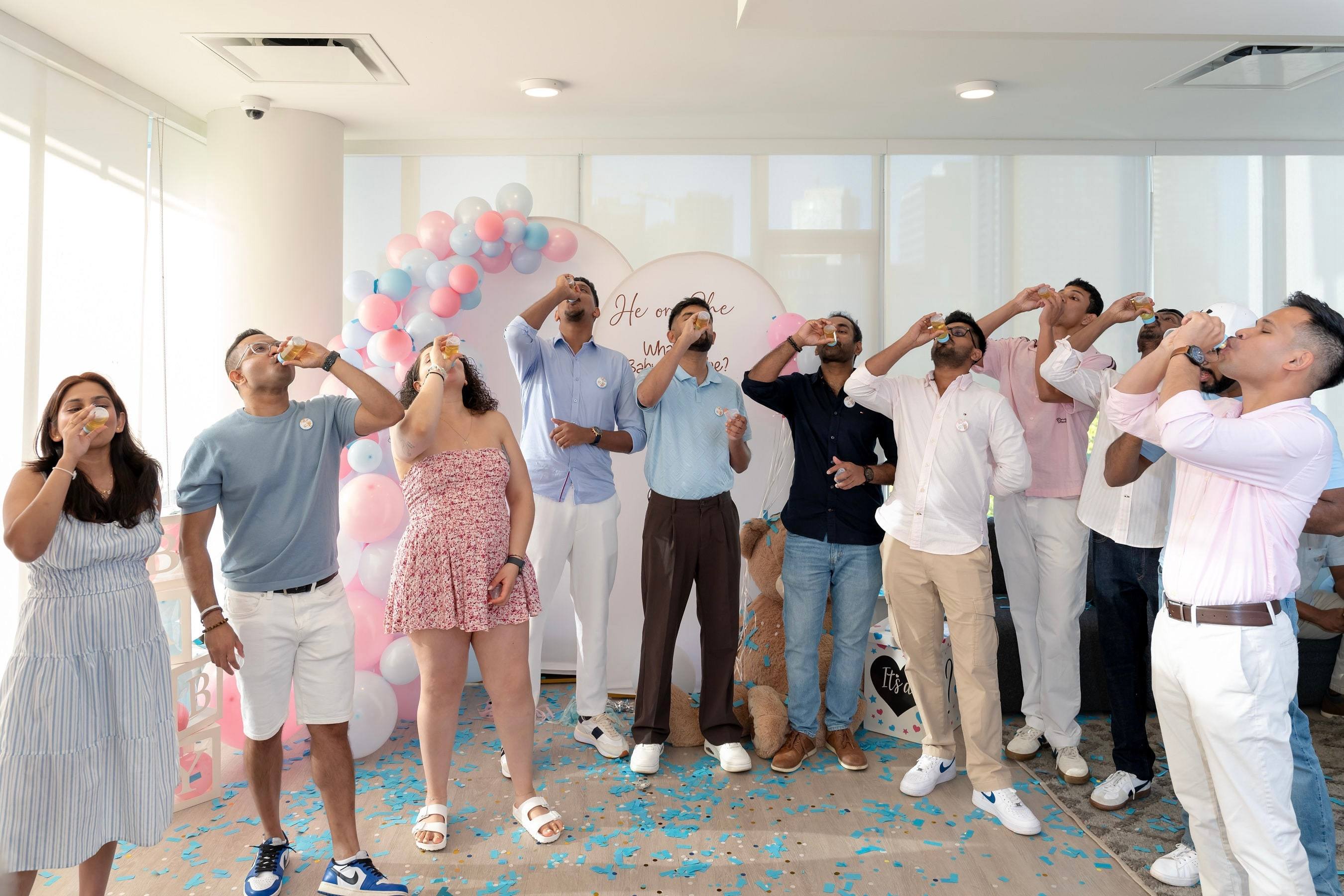 Guests looking up and cheering during the gender reveal moment
