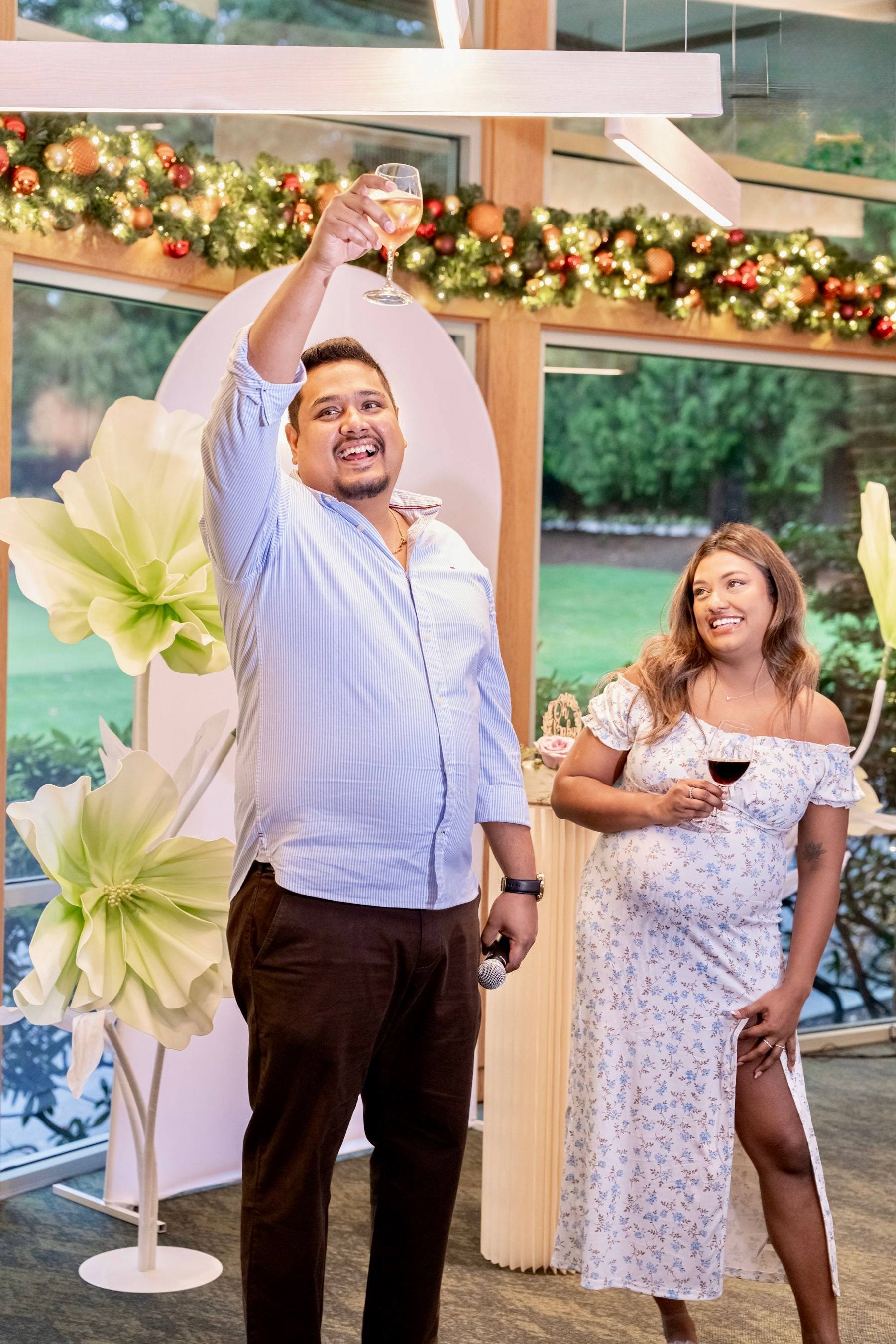 Father-to-be taking a selfie with guests at the shower