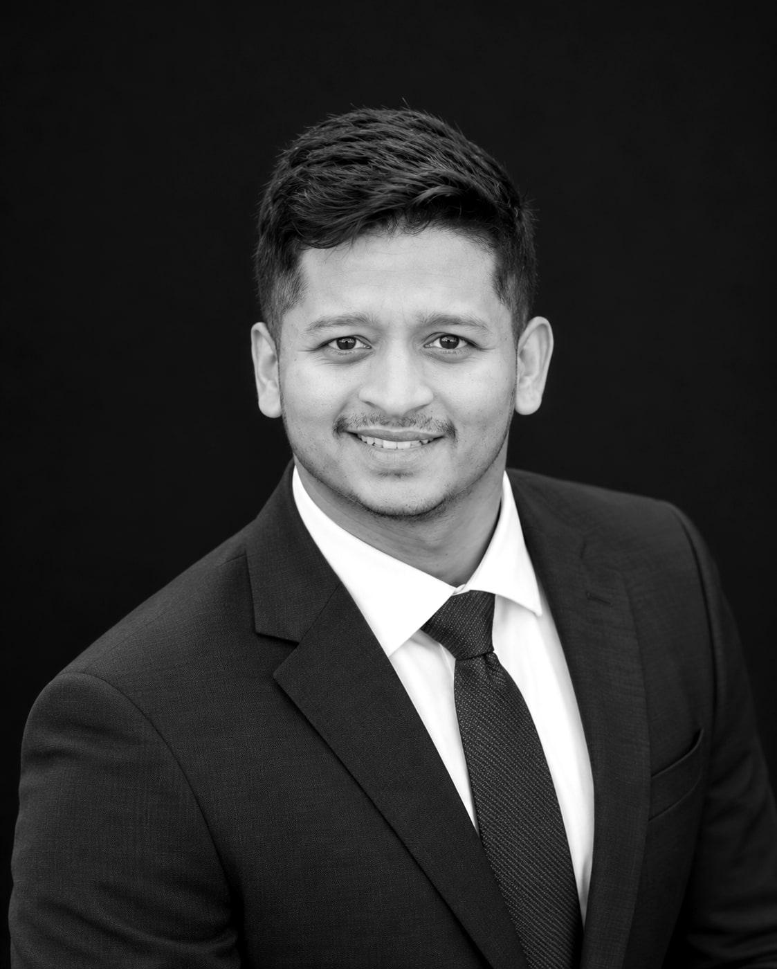 Black and white portrait of Milan, photographer and founder of Chapter We